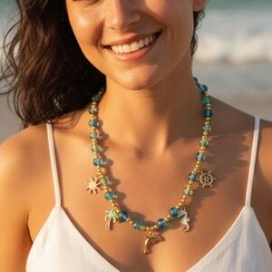 Elegant Blue and Gold Charm Necklace